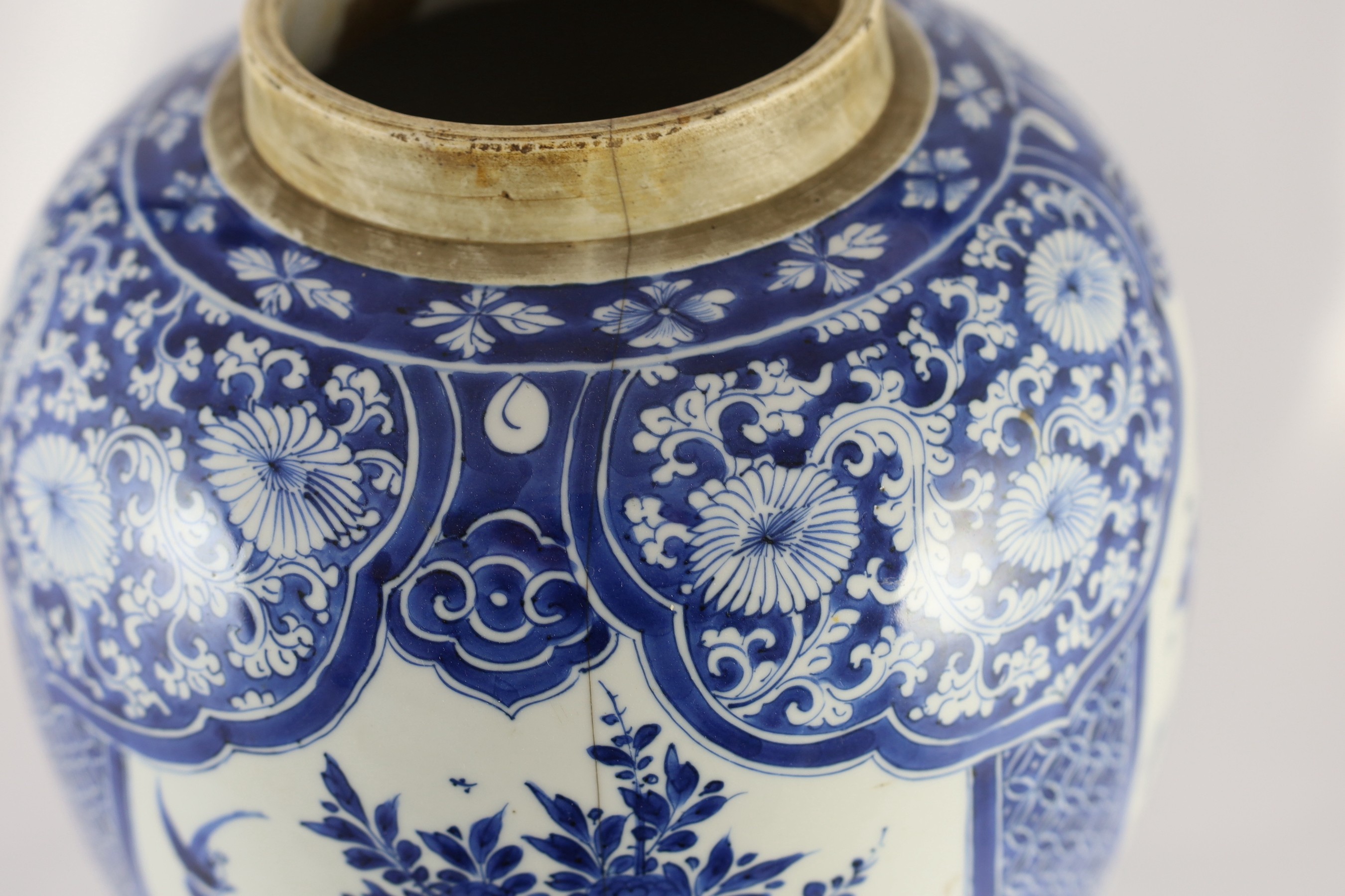 A large Chinese blue and white large ovoid jar, Kangxi period, 45cm high, cracked